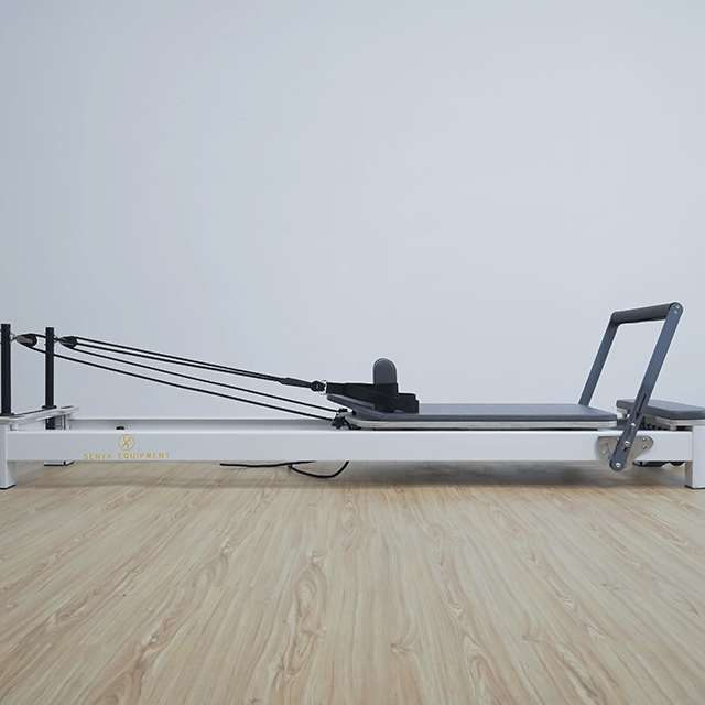 Máquina de barra de pies fija Pilates Reformer de aluminio para elegir